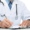A doctor in a white coat with a stethoscope around their neck writes on a clipboard at a desk, possibly reviewing causes of Dupuytrens disease, with only their torso and hands visible.