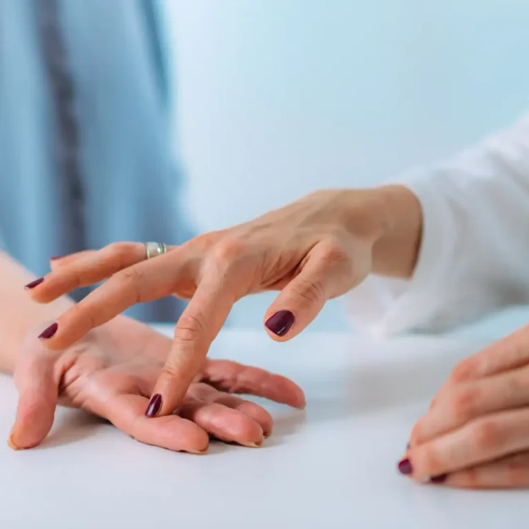 examining-the-hand-of-a-senior-patient-with-carpal-2026-03-10-04-50-31-utc