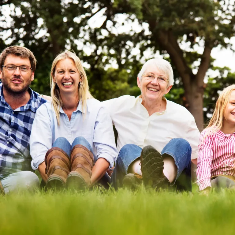 Family sitting in a park